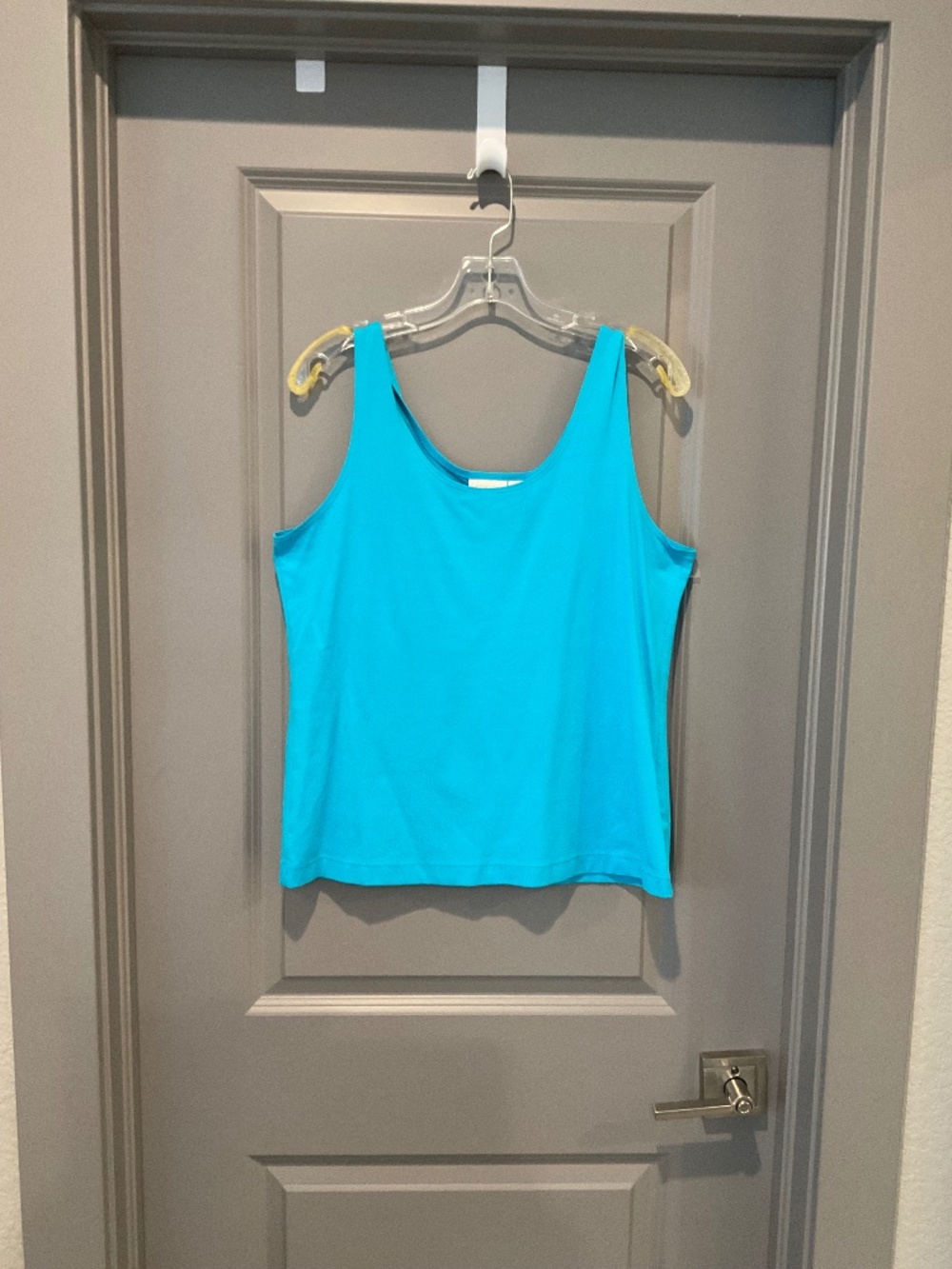 Turquoise colored tank top